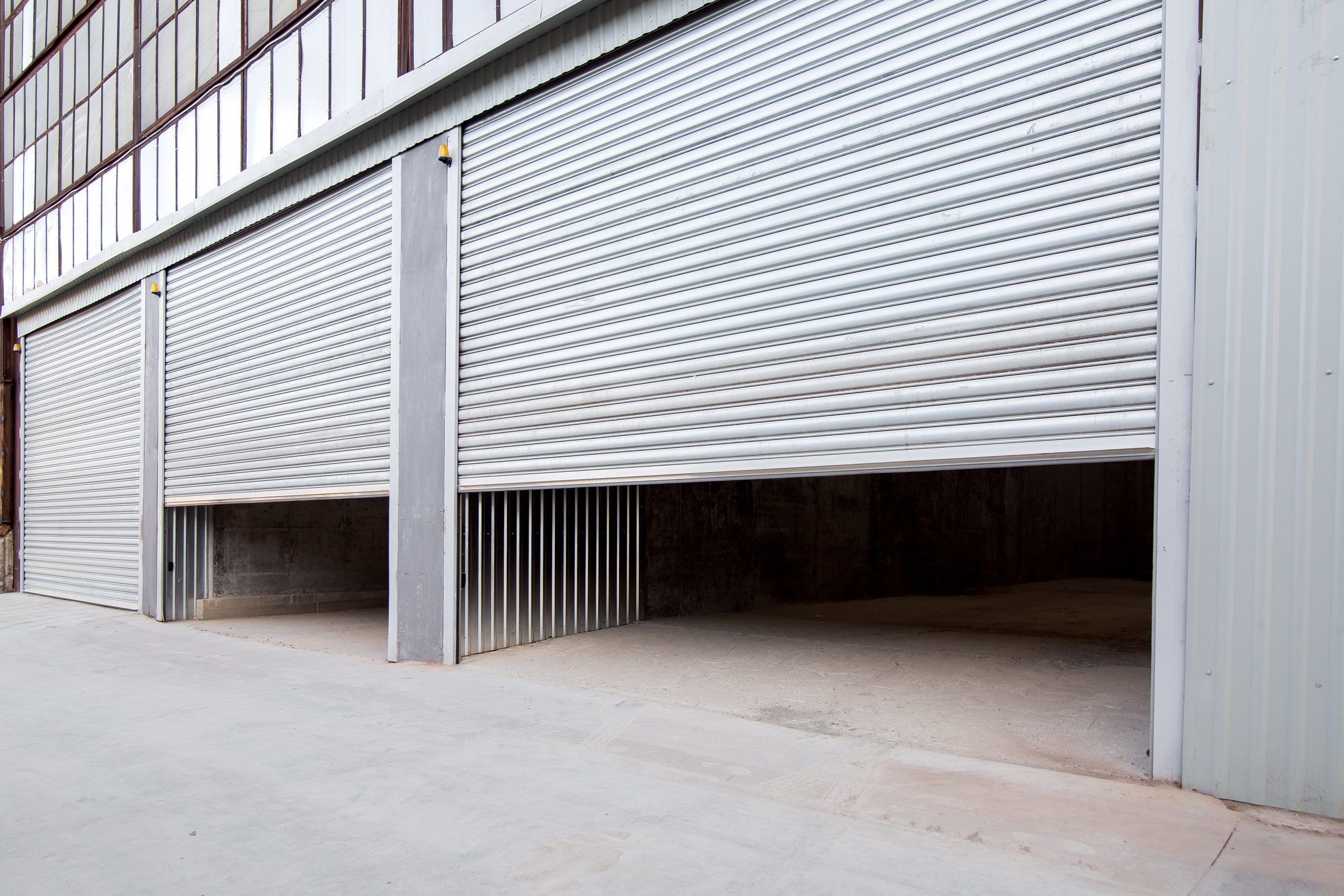 Sectional Roll Up Garage Door Repairs and Installations